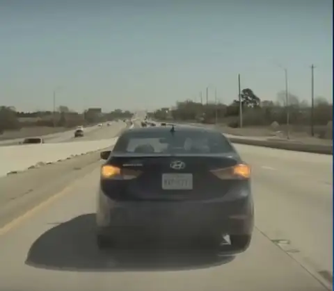 Dash cam footage of the road ahead on a motorway